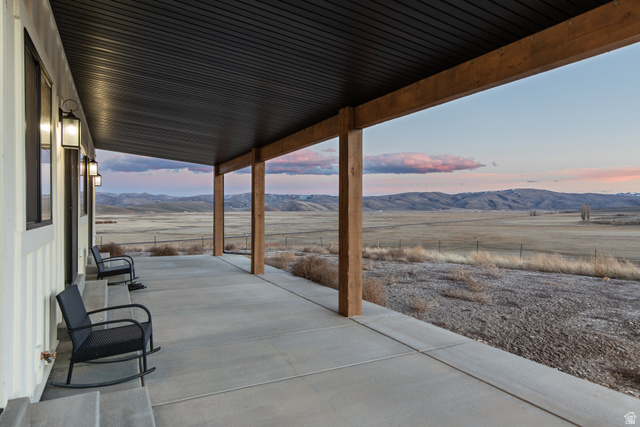 2920 West Temple Cyn Road Laketown, UT 84038 - Photo 4 of 69 Expansive view of the meadows surrounding the home.