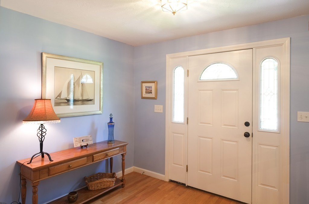 34 Wallace Road Wayland, MA 01778 - Photo 8 of 24 a room with closet table and mirror