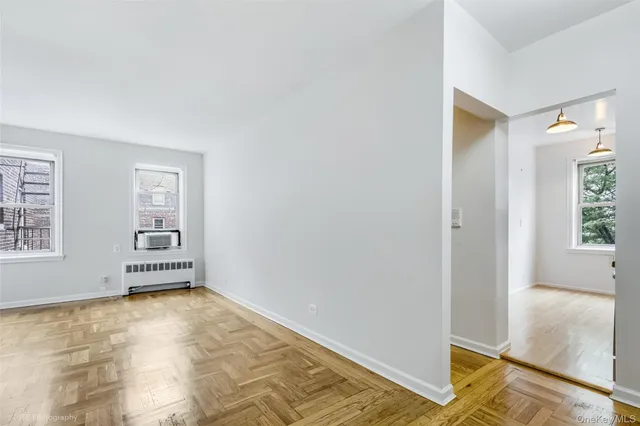 a view of an empty room and window