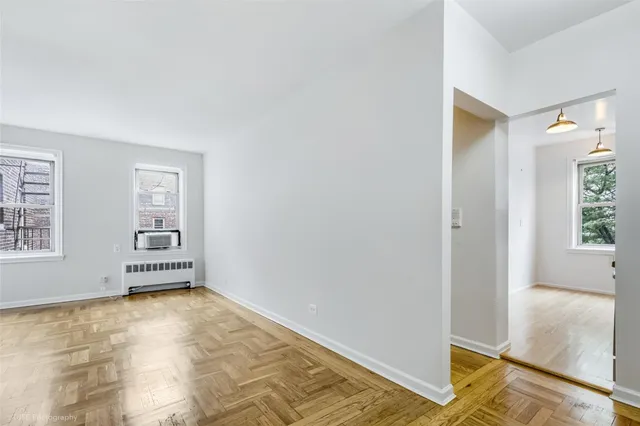 a view of an empty room and window