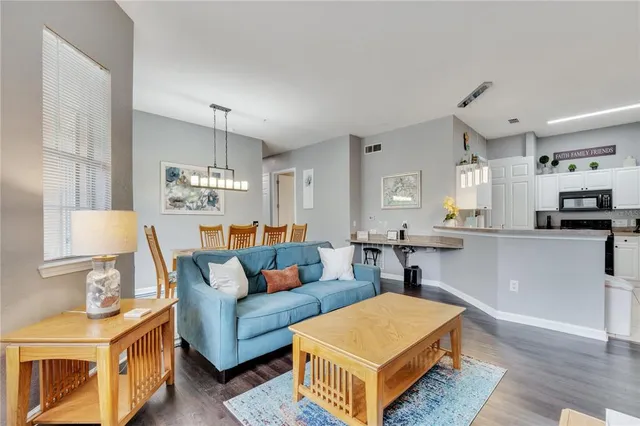 a view of a kitchen and dining room