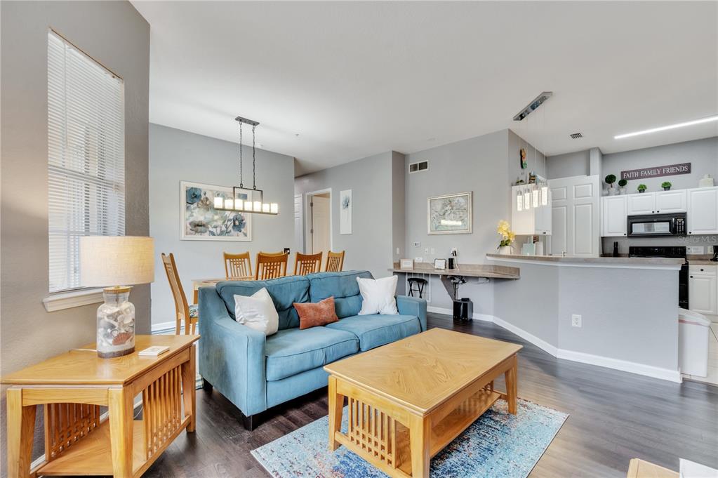 505 Terrace Ridge Circle, Unit 505 Davenport, FL 33896 - Photo 20 of 47 a living room with furniture and a rug