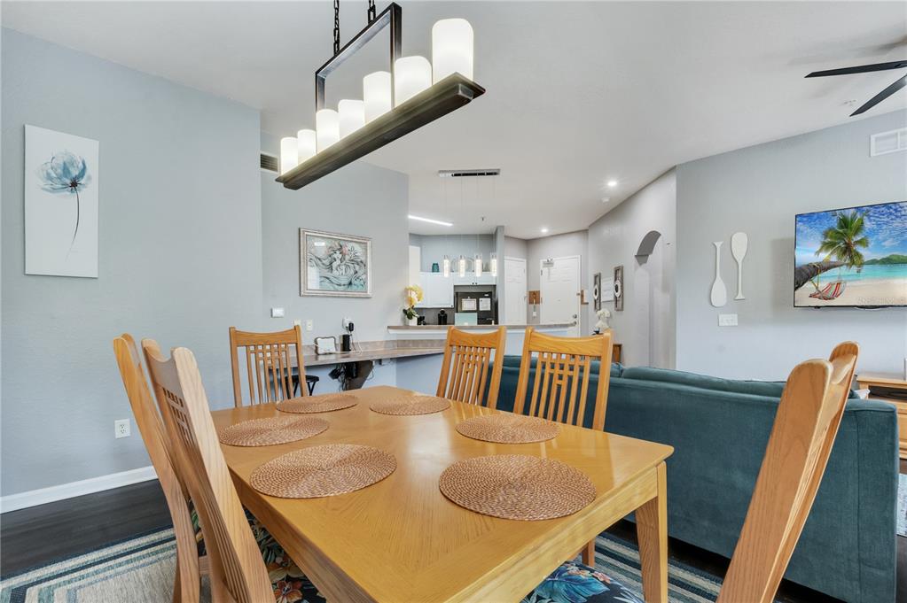 505 Terrace Ridge Circle, Unit 505 Davenport, FL 33896 - Photo 23 of 47 a view of a dining room with furniture