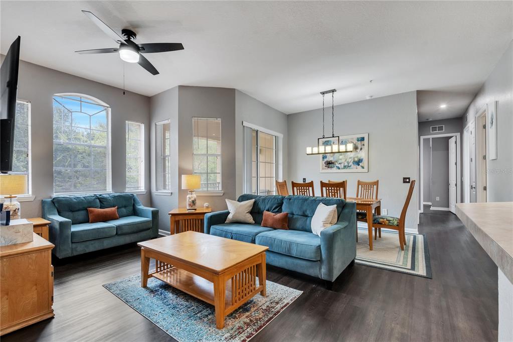 505 Terrace Ridge Circle, Unit 505 Davenport, FL 33896 - Photo 3 of 47 a living room with furniture and a large window