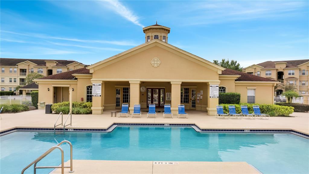 505 Terrace Ridge Circle, Unit 505 Davenport, FL 33896 - Photo 44 of 47 a view of a house with pool table and chairs