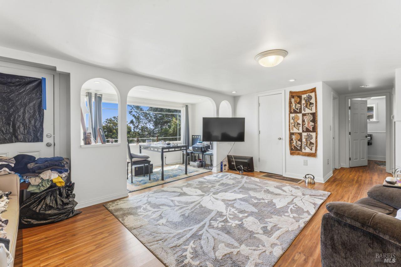 111 Altena Street San Rafael, CA 94901 - Photo 20 of 46 a bedroom with furniture and a flat screen tv