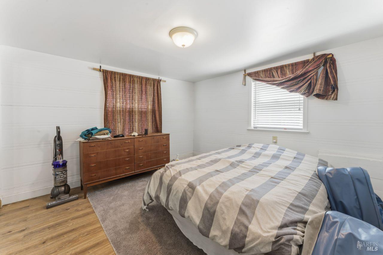 111 Altena Street San Rafael, CA 94901 - Photo 26 of 46 a bedroom with a bed and a window