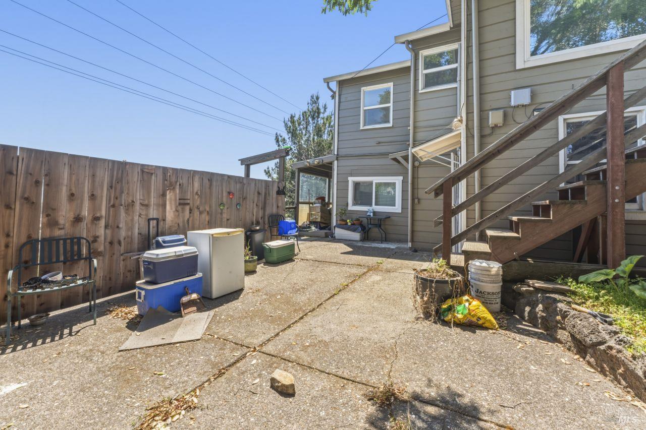 111 Altena Street San Rafael, CA 94901 - Photo 30 of 46 a view of a patio with table and chairs and potted plants
