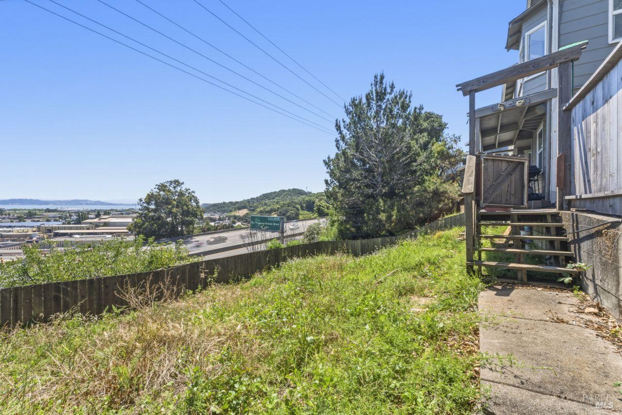 111 Altena Street San Rafael, CA 94901 - Photo 33 of 46 a view of a lake with a building in the background