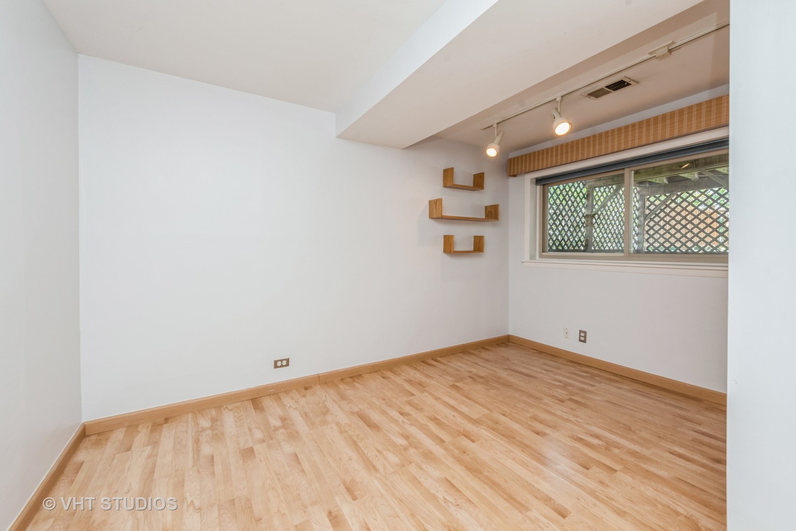 637 Sycamore Road Buffalo Grove, IL 60089 - Photo 13 of 23 a view of empty room with wooden floor