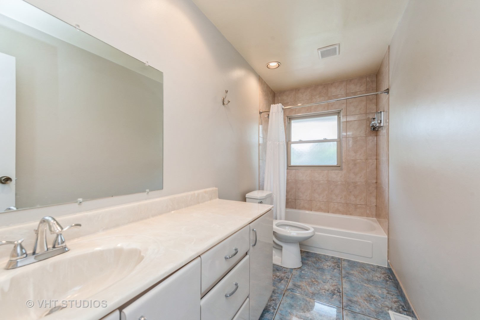 637 Sycamore Road Buffalo Grove, IL 60089 - Photo 14 of 23 a bathroom with a granite countertop sink a toilet and shower