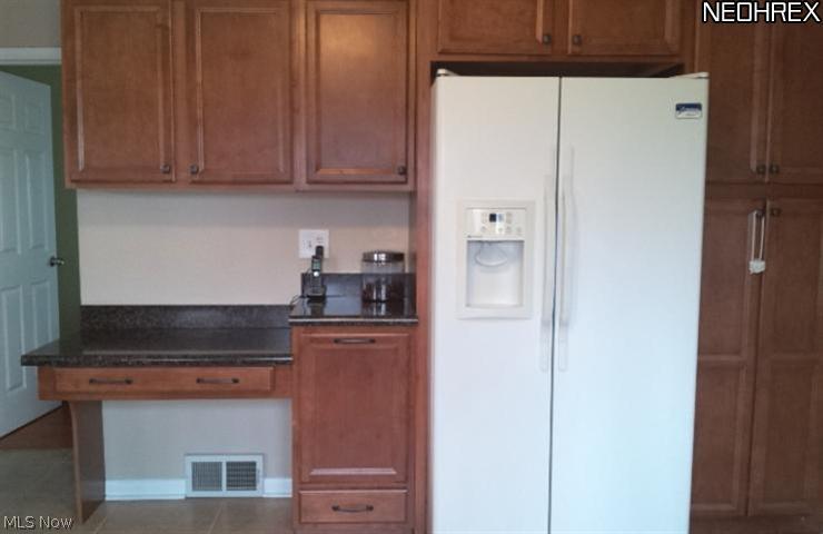 399 South Miller Road Akron, OH 44333 - Photo 8 of 20 Organization center for the kitchen. Plenty of storage in this space.