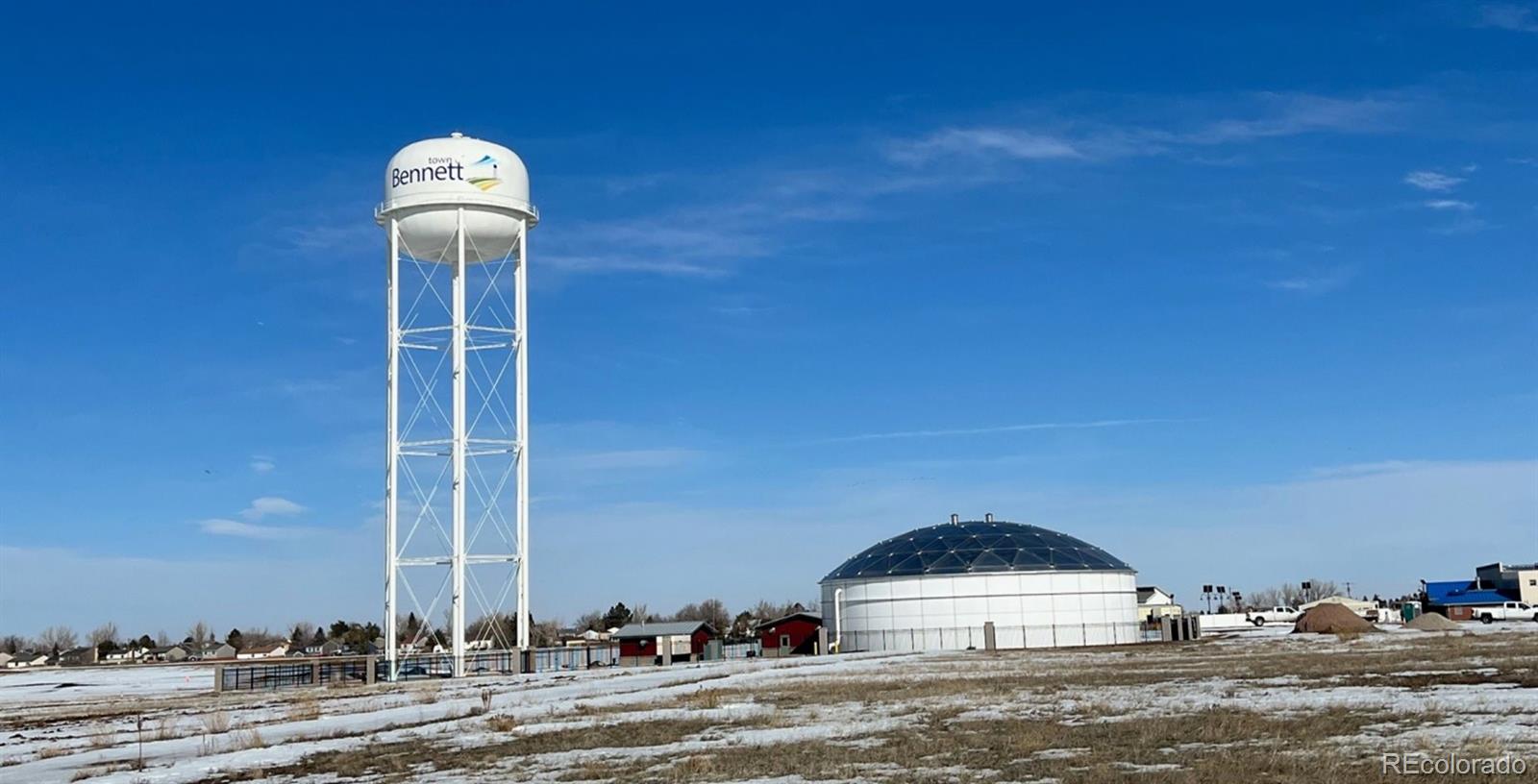 239 Adams Street Bennett, CO 80102 - Photo 3 of 5 a view of parking and small yard