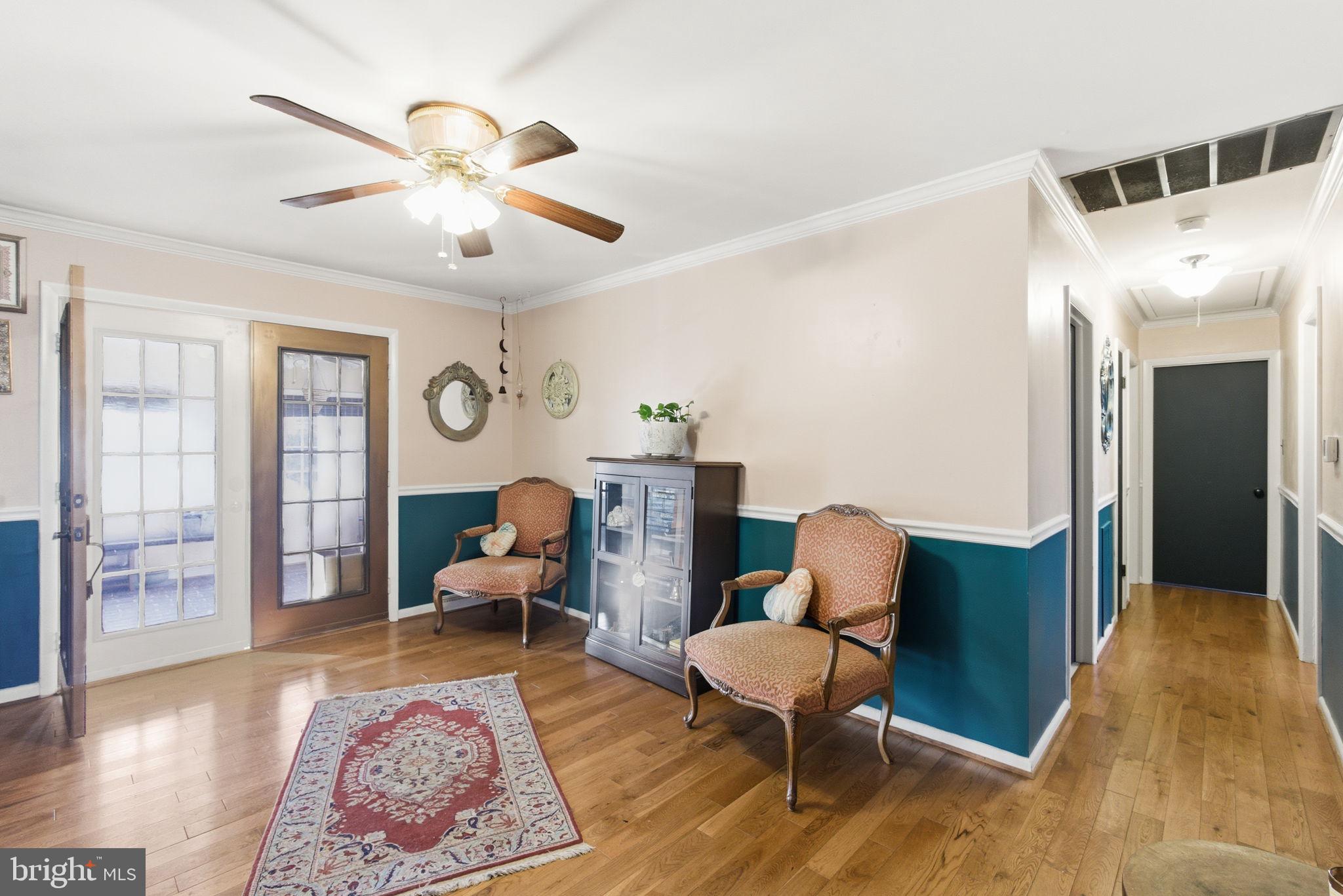 9769 Trinity Church Road Charlotte Hall, MD 20622 - Photo 11 of 61 a living room with furniture and wooden floor