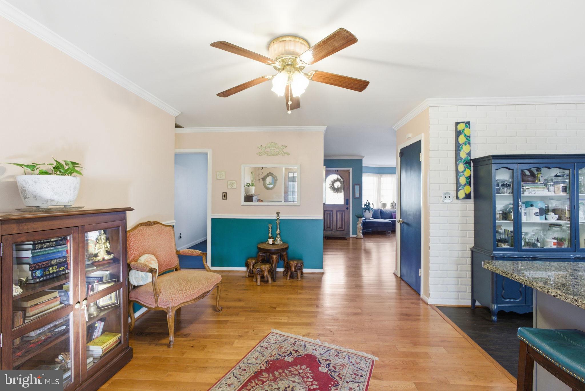 9769 Trinity Church Road Charlotte Hall, MD 20622 - Photo 9 of 61 a living room with furniture and wooden floor
