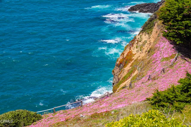 a view of a lake with houses in ocean
