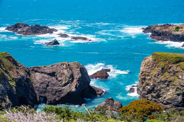 a view of a lake with a city