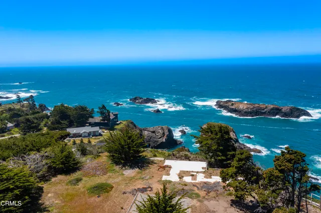 a view of ocean with beach