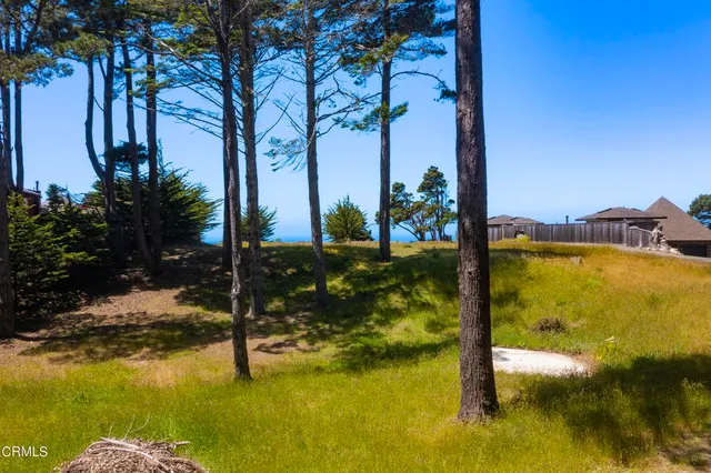a view of a swimming pool with an outdoor space and seating area