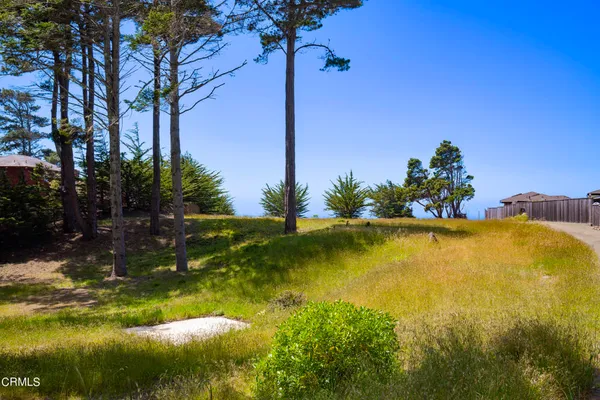 a view of a lake with houses