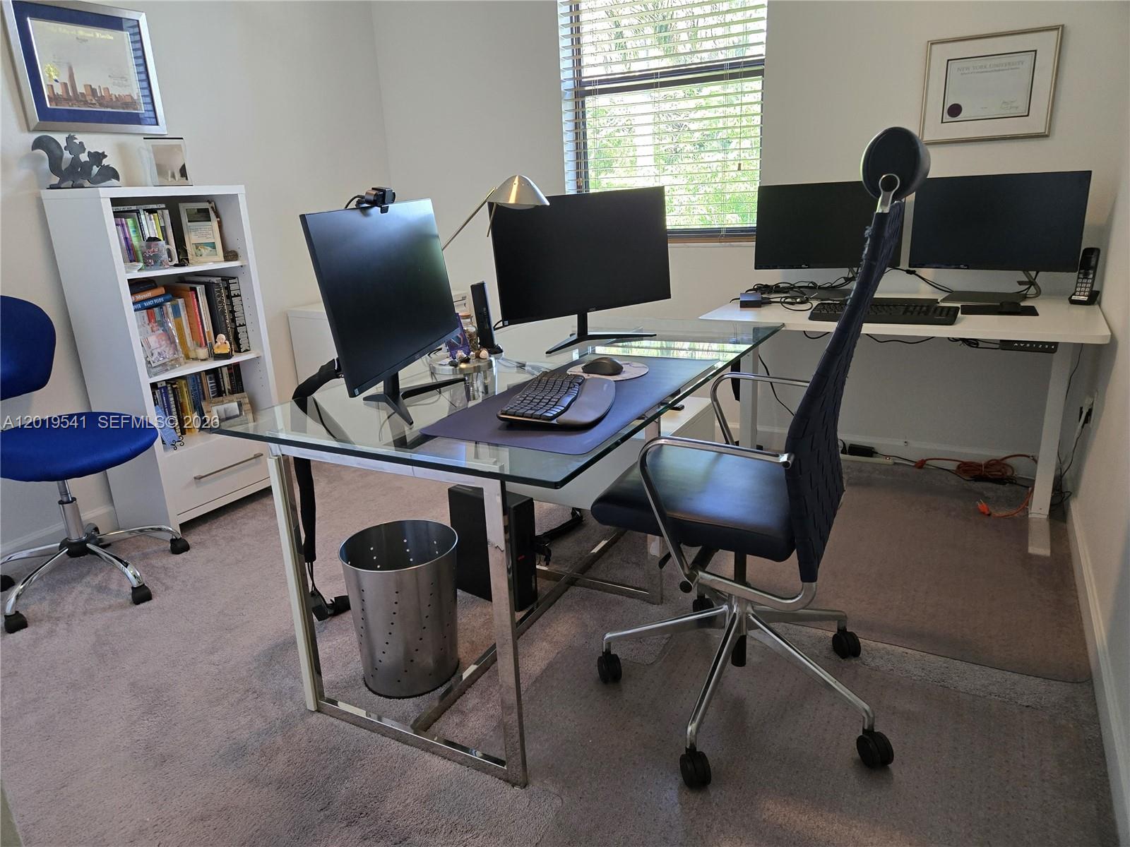 24400 Southwest 119th Place Homestead, FL 33032 - Photo 16 of 22 a view of a workspace with furniture and a window