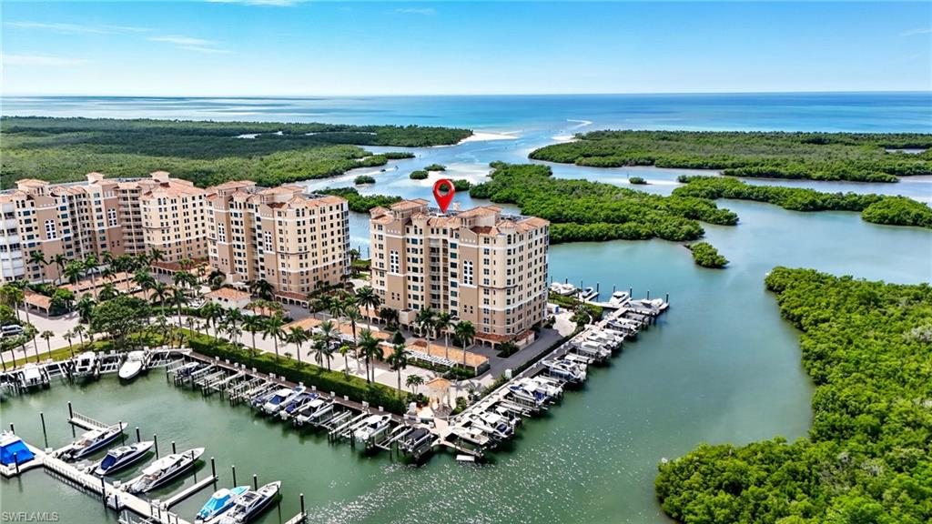445 Dockside Drive, Unit B202 Naples, FL 34110 - Photo 47 of 50 445 Building in Pelican Isle offers privacy at the end of the peninsula.