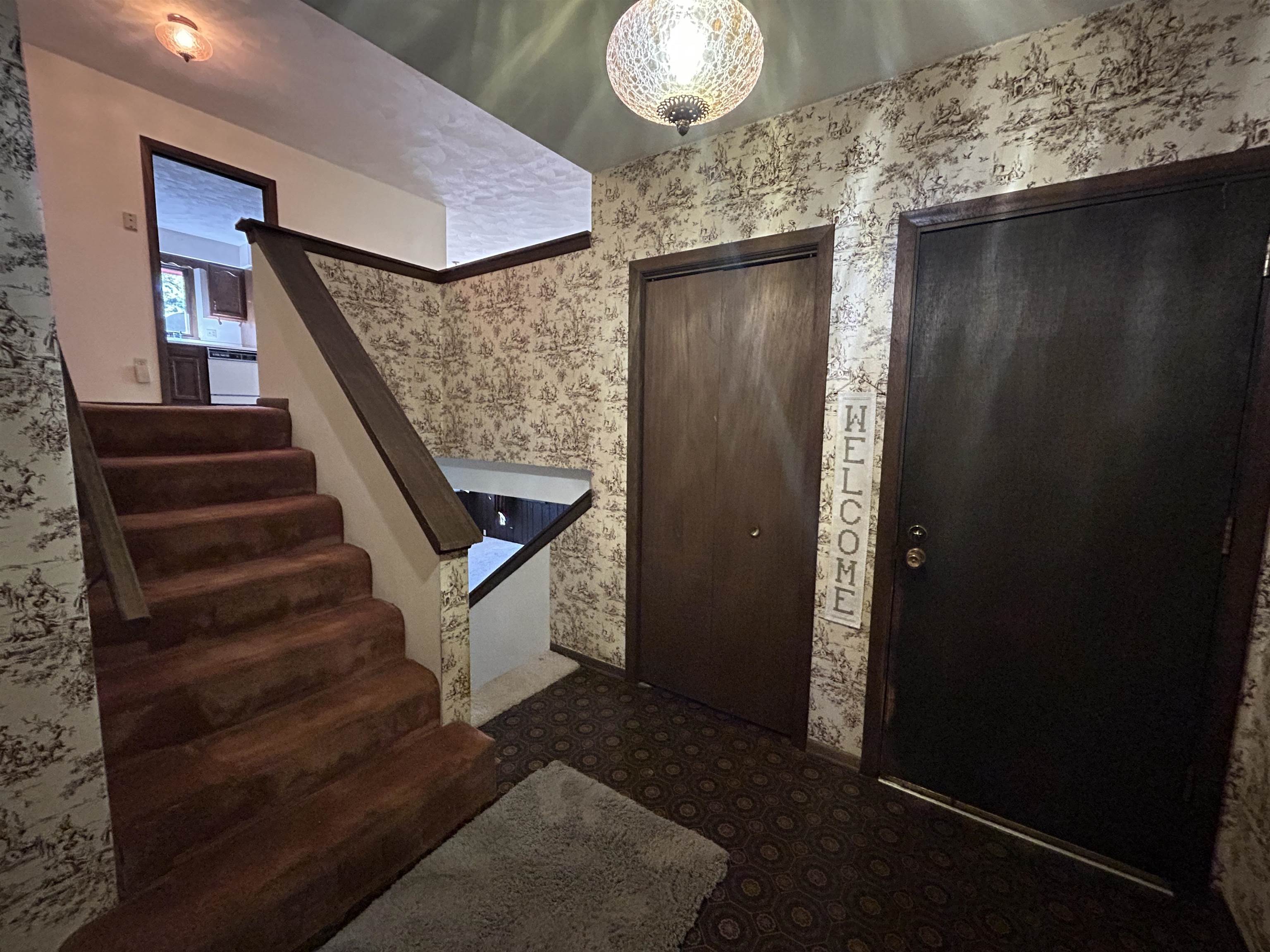 9632 Beaver Valley Road Belvidere, IL 61008 - Photo 6 of 19 a view of entryway and hall with wooden floor