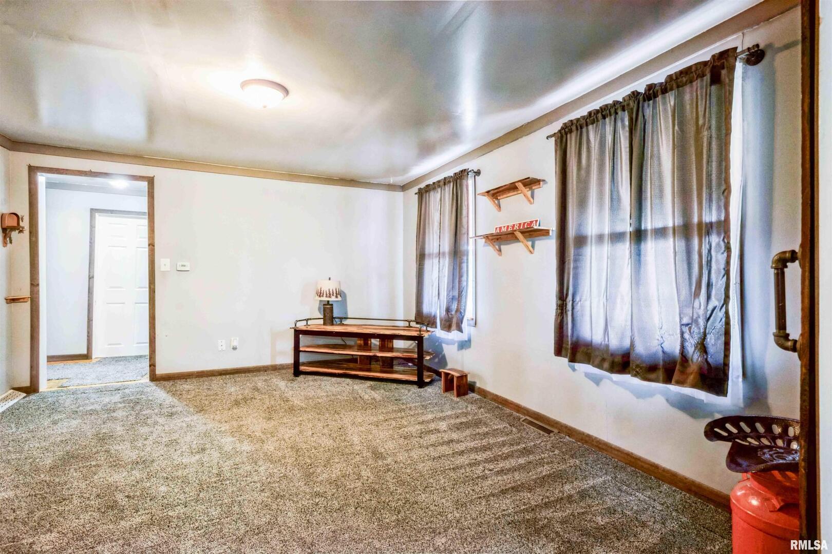 305 East 3rd Street Mineral, IL 61344 - Photo 11 of 22 a view of room with front door