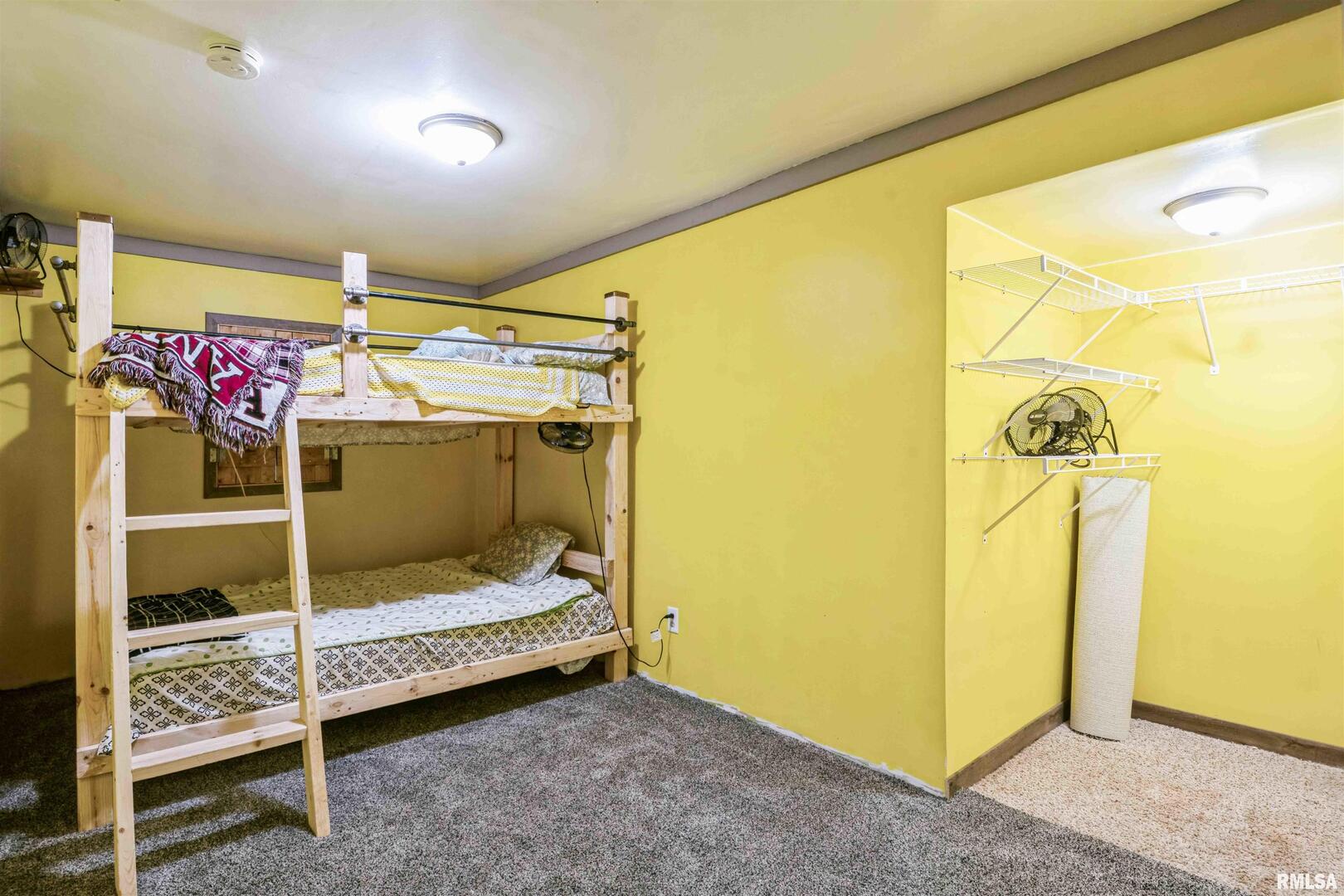 305 East 3rd Street Mineral, IL 61344 - Photo 15 of 22 a bedroom with bed and a window