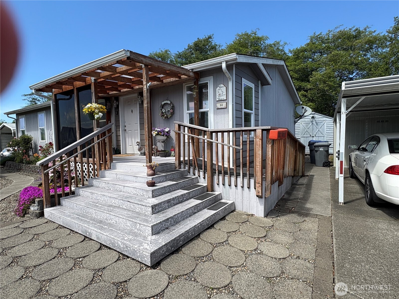 51 Meander Way Aberdeen, WA 98520 - Photo 5 of 22 a view of a house with wooden deck and furniture