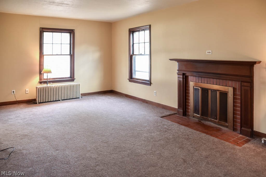 3138 Brady Lake Road Ravenna, OH 44266 - Photo 2 of 18 Spacious living room with a fireplace.