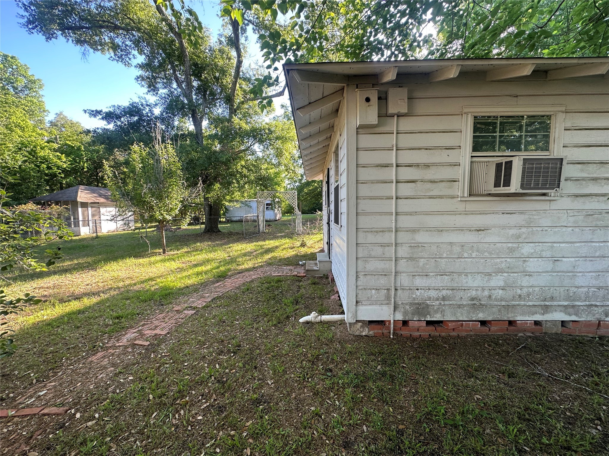 326 Prospect Drive Trinity, TX 75862 - Photo 21 of 22 a view of a house with a yard