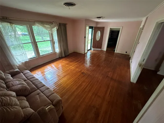 a view of livingroom with furniture and window