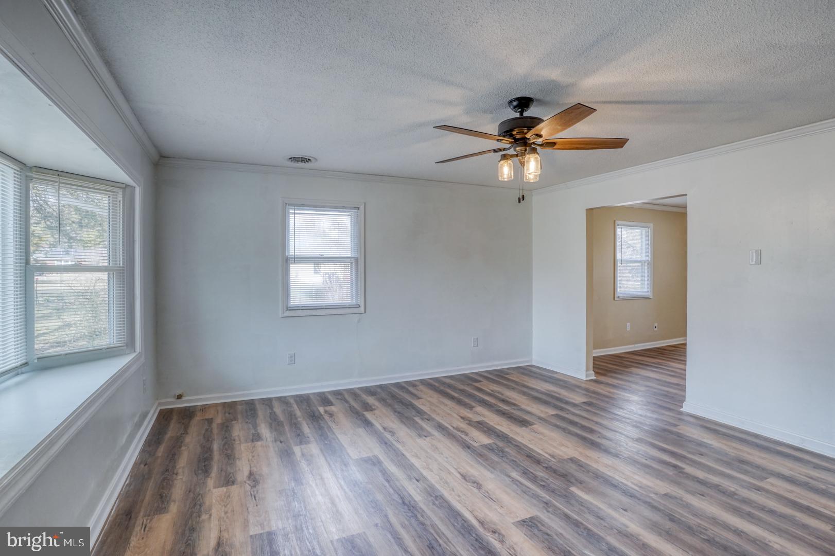 43 Cherry Drive Magnolia, DE 19962 - Photo 11 of 34 wooden floor in an empty room with a window