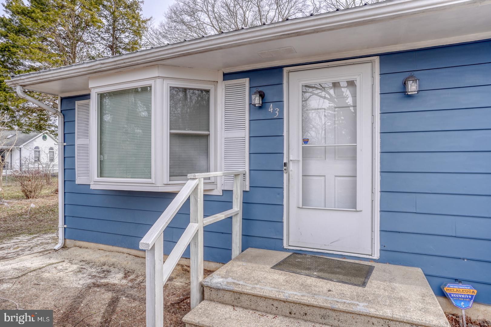 43 Cherry Drive Magnolia, DE 19962 - Photo 2 of 34 a front view of a house
