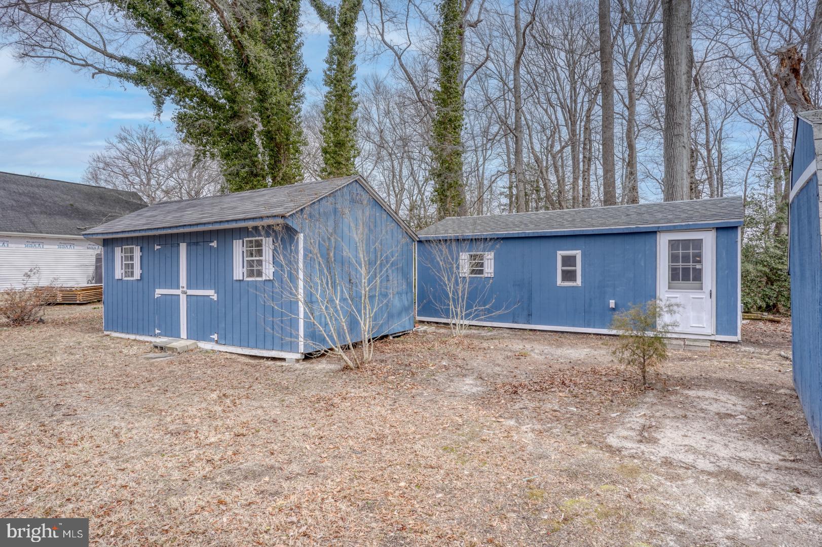 43 Cherry Drive Magnolia, DE 19962 - Photo 29 of 34 a view of a house with a yard and large tree