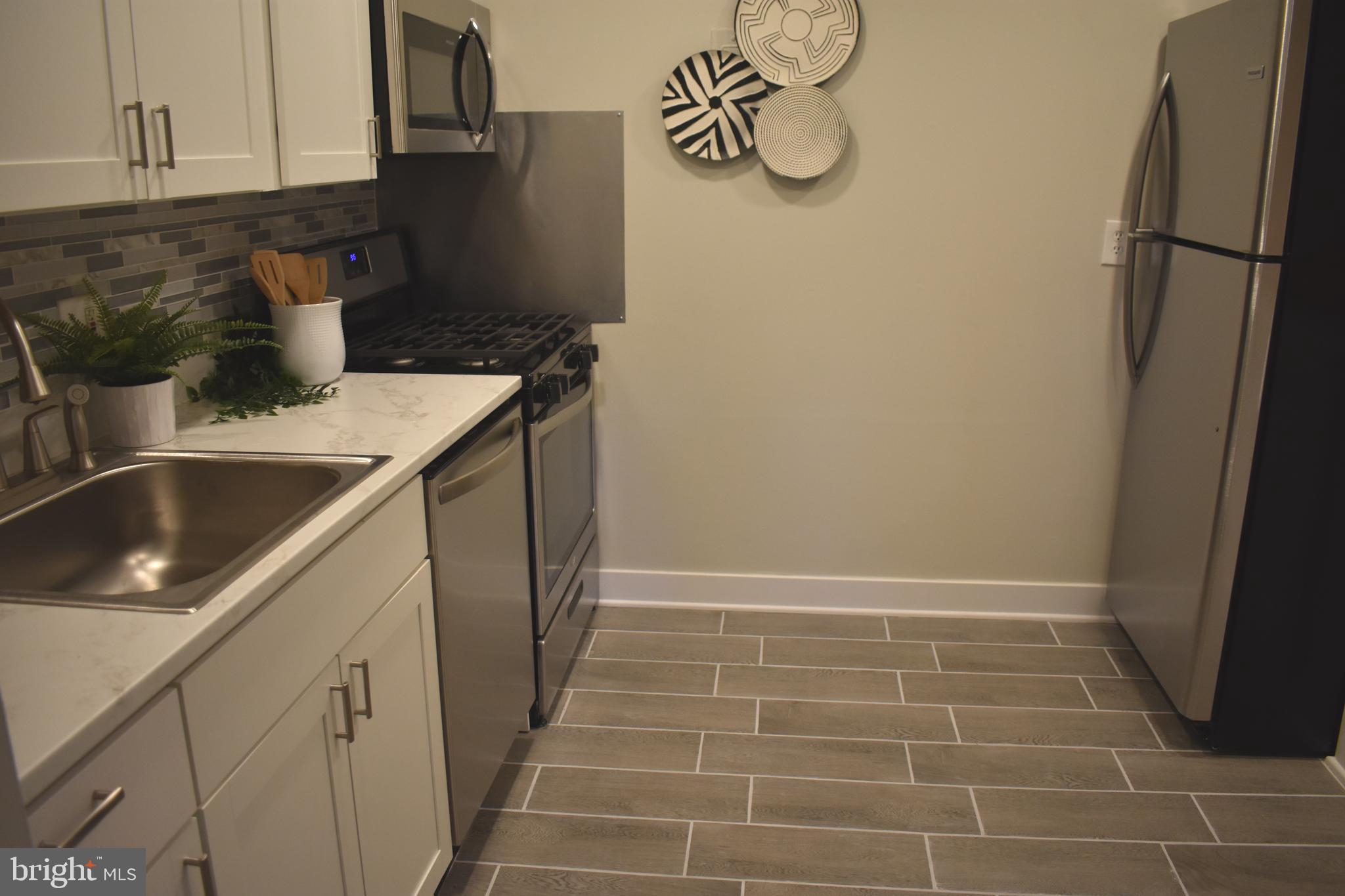 3850 Bel Pre Road, Unit 14 Silver Spring, MD 20906 - Photo 118 of 140 Kitchen-Tile floor