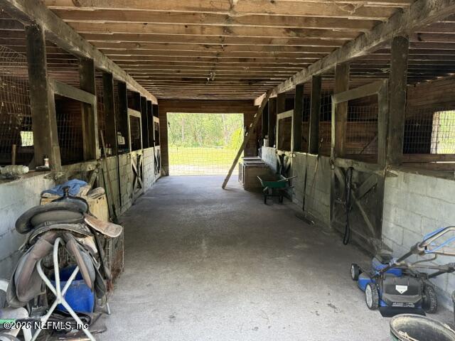 5214 Carter Spencer Road Middleburg, FL 32068 - Photo 6 of 50 a view of a porch with furniture and gym equipment