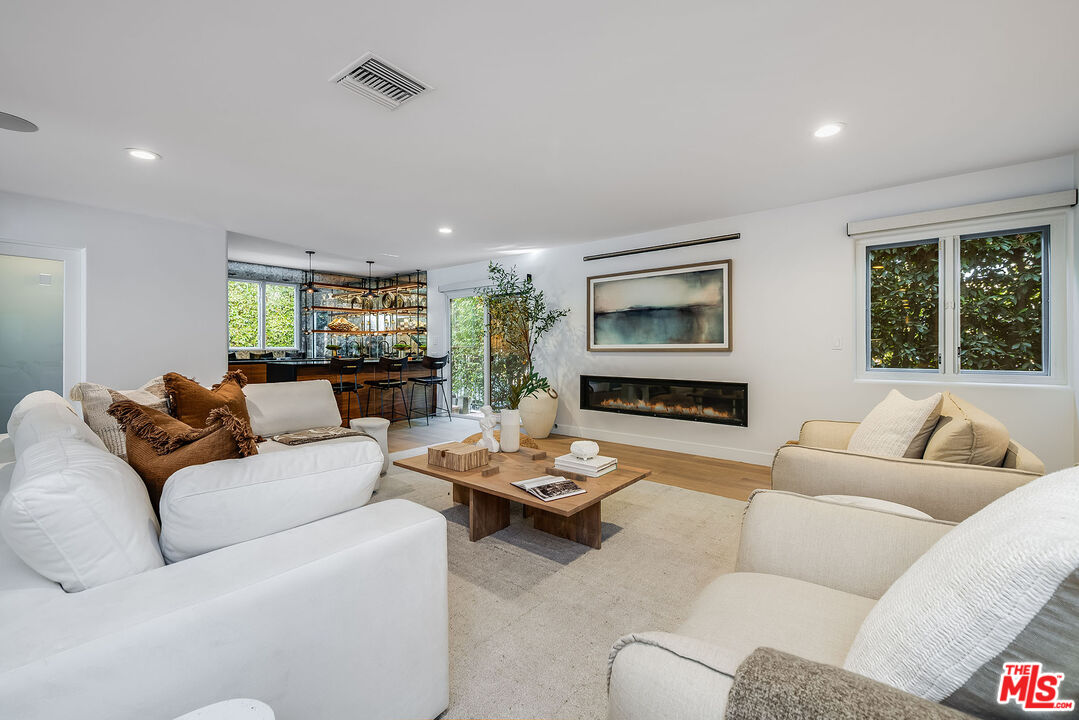 3201 Viola Place Marina del Rey, CA 90292 - Photo 12 of 72 a living room with furniture and a large window