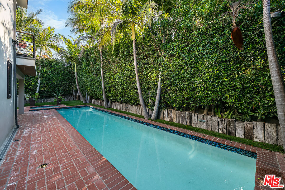 3201 Viola Place Marina del Rey, CA 90292 - Photo 27 of 72 a view of swimming pool with a large trees and plants