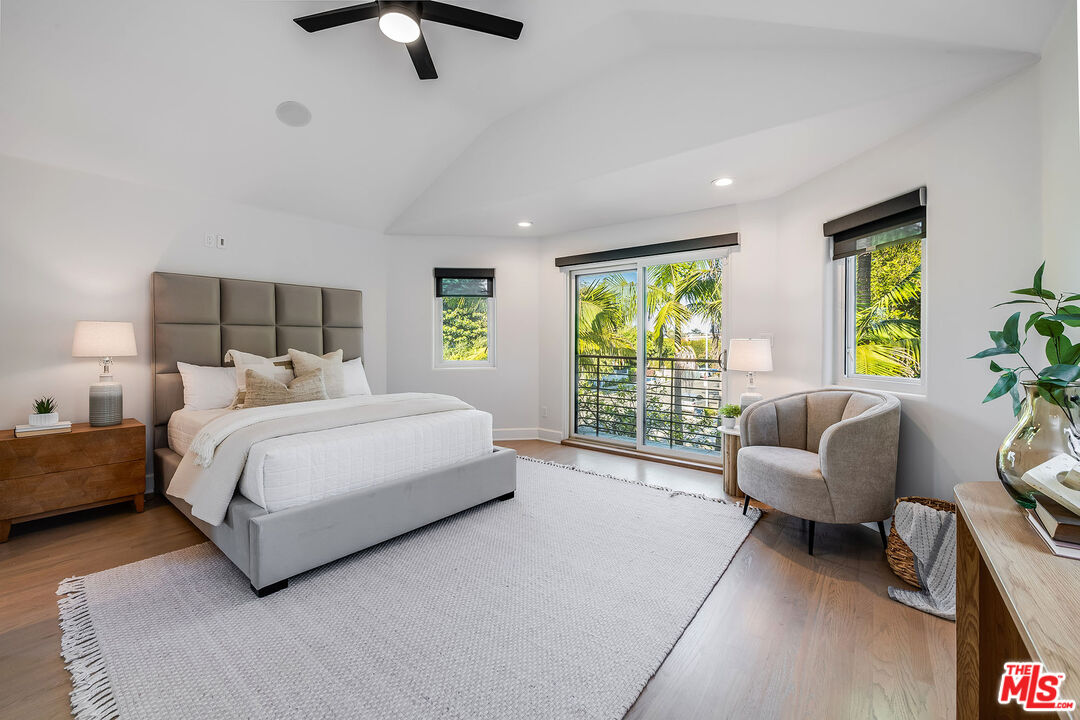 3201 Viola Place Marina del Rey, CA 90292 - Photo 49 of 72 a spacious bedroom with a bed and a couch
