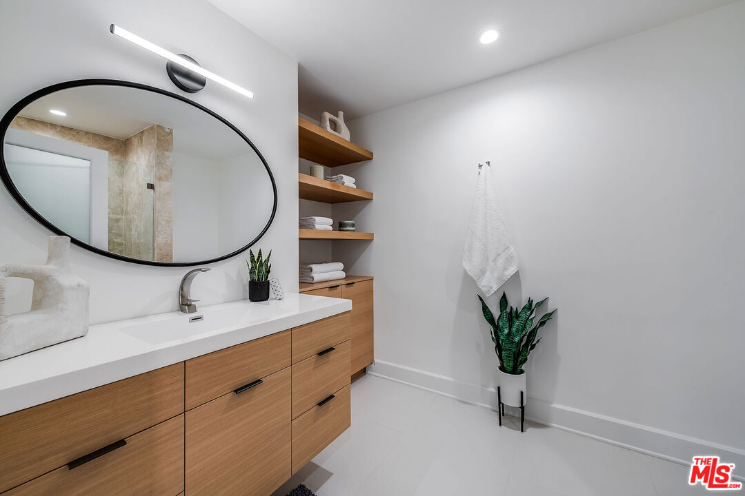 3201 Viola Place Marina del Rey, CA 90292 - Photo 60 of 72 a bathroom with a sink and a mirror