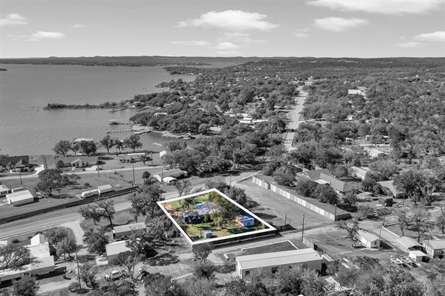 12409 Ranch Road 2341 Burnet, TX 78611 - Photo 2 of 15 an aerial view of a residential houses with outdoor space