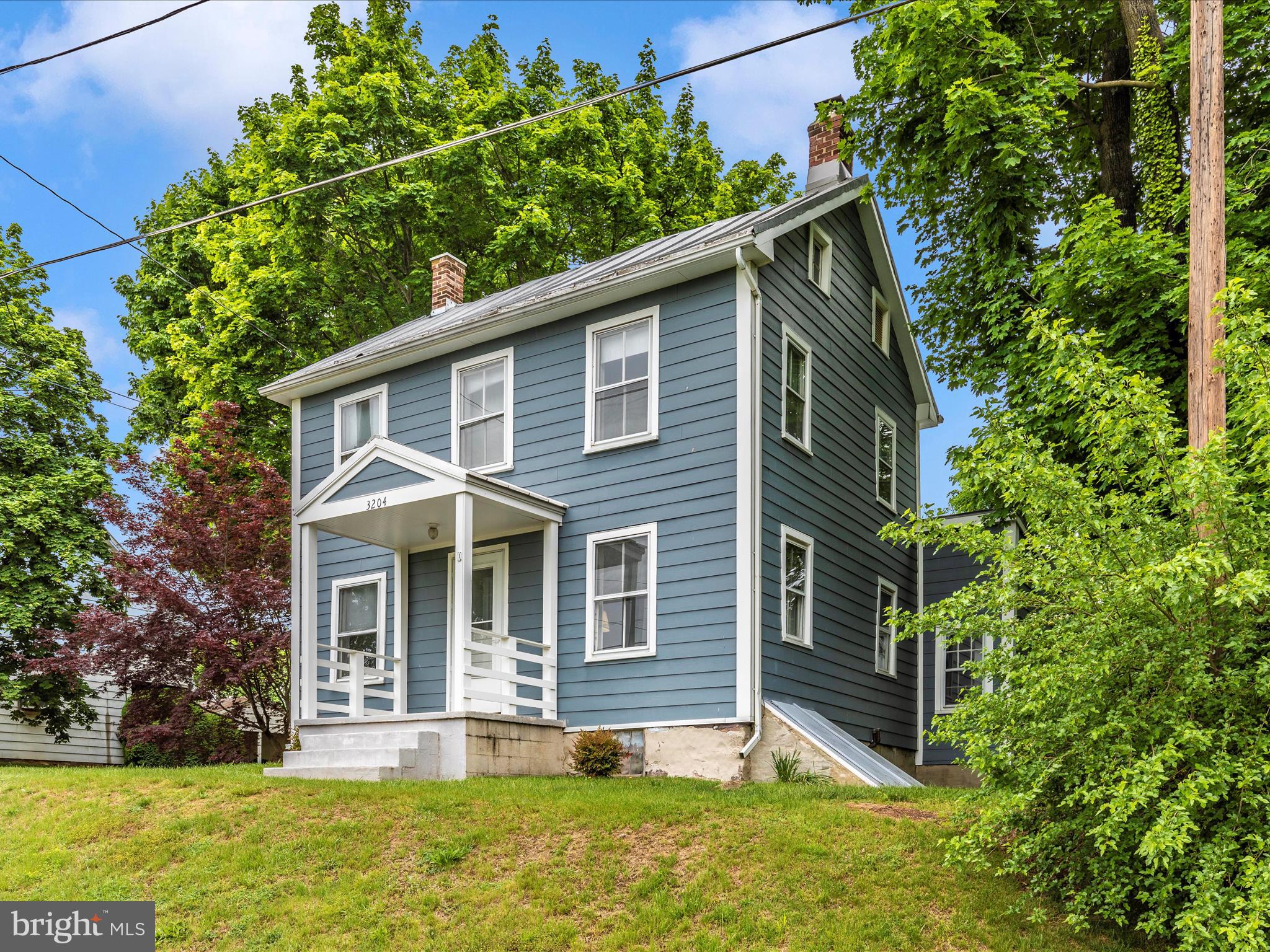 3204 Uniontown Road Westminster, MD 21158 - Photo 2 of 51 a front view of house with yard