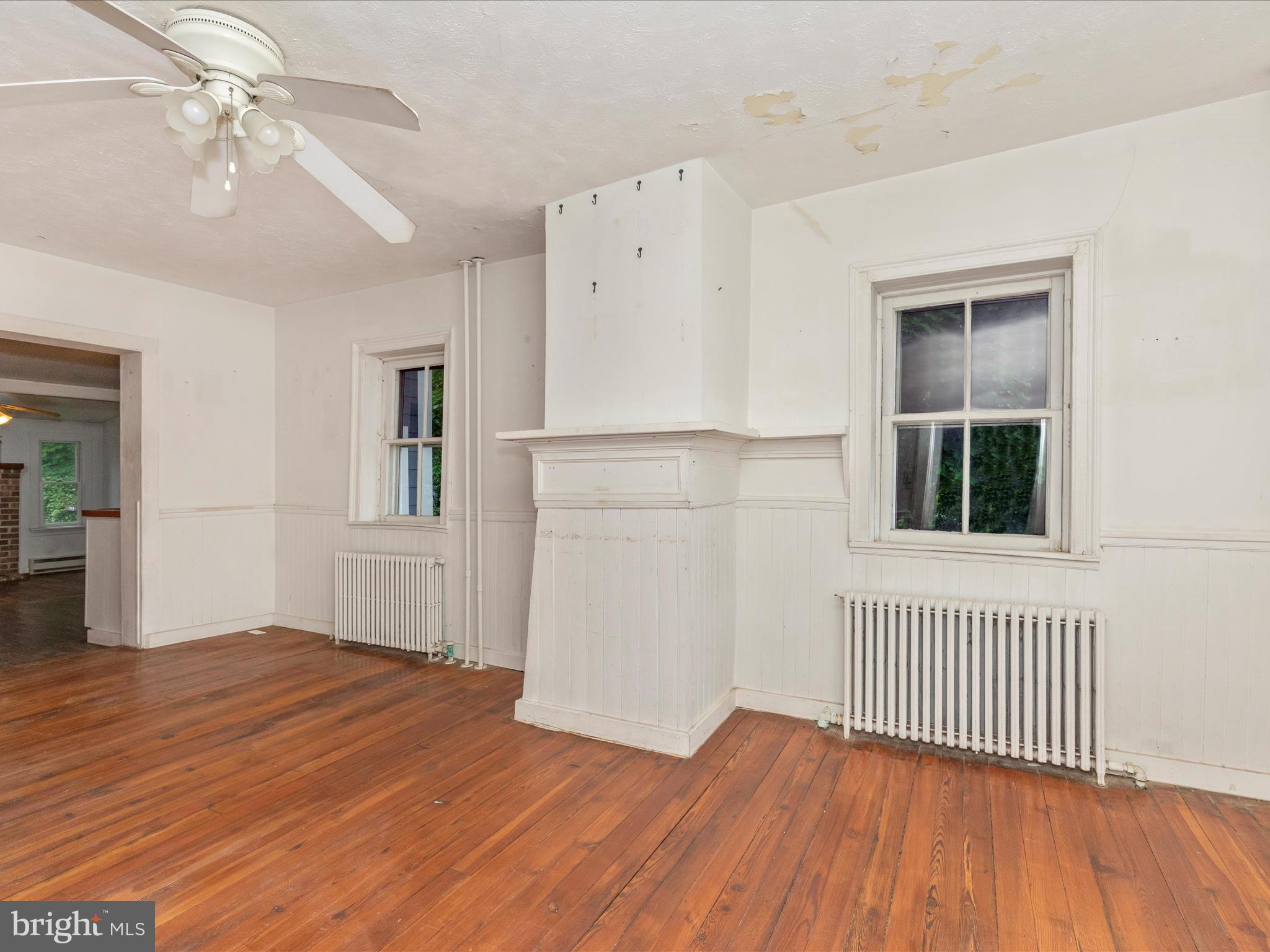 3204 Uniontown Road Westminster, MD 21158 - Photo 29 of 51 wooden floor in an empty room with a window