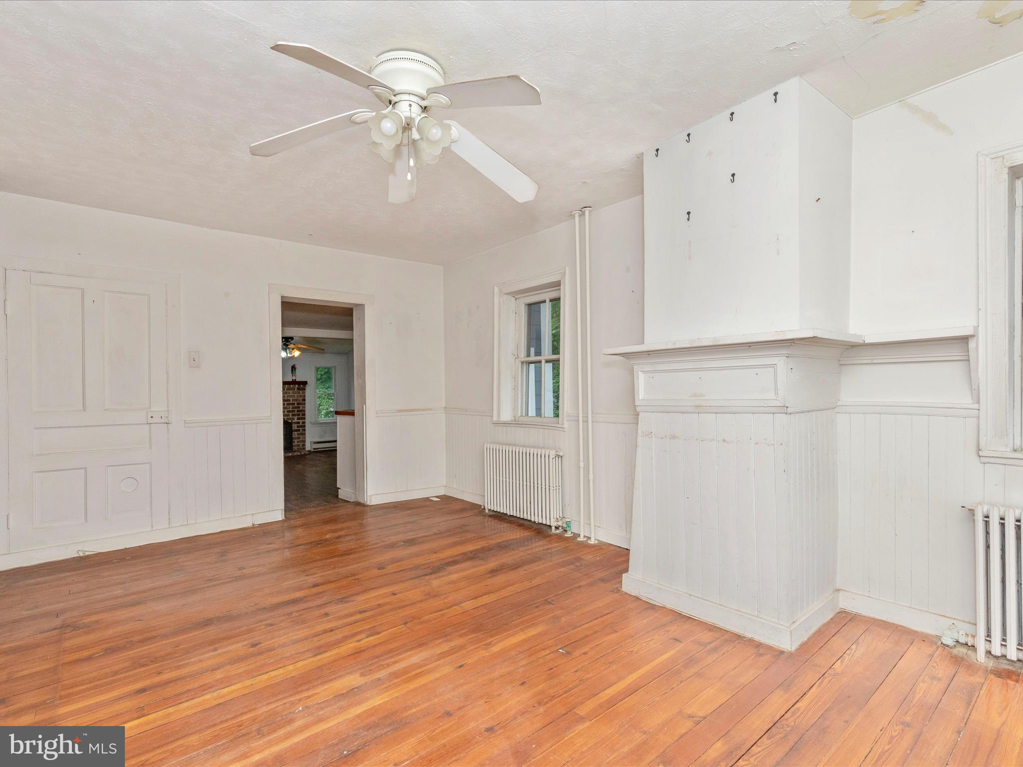3204 Uniontown Road Westminster, MD 21158 - Photo 30 of 51 a view of empty room with wooden floor