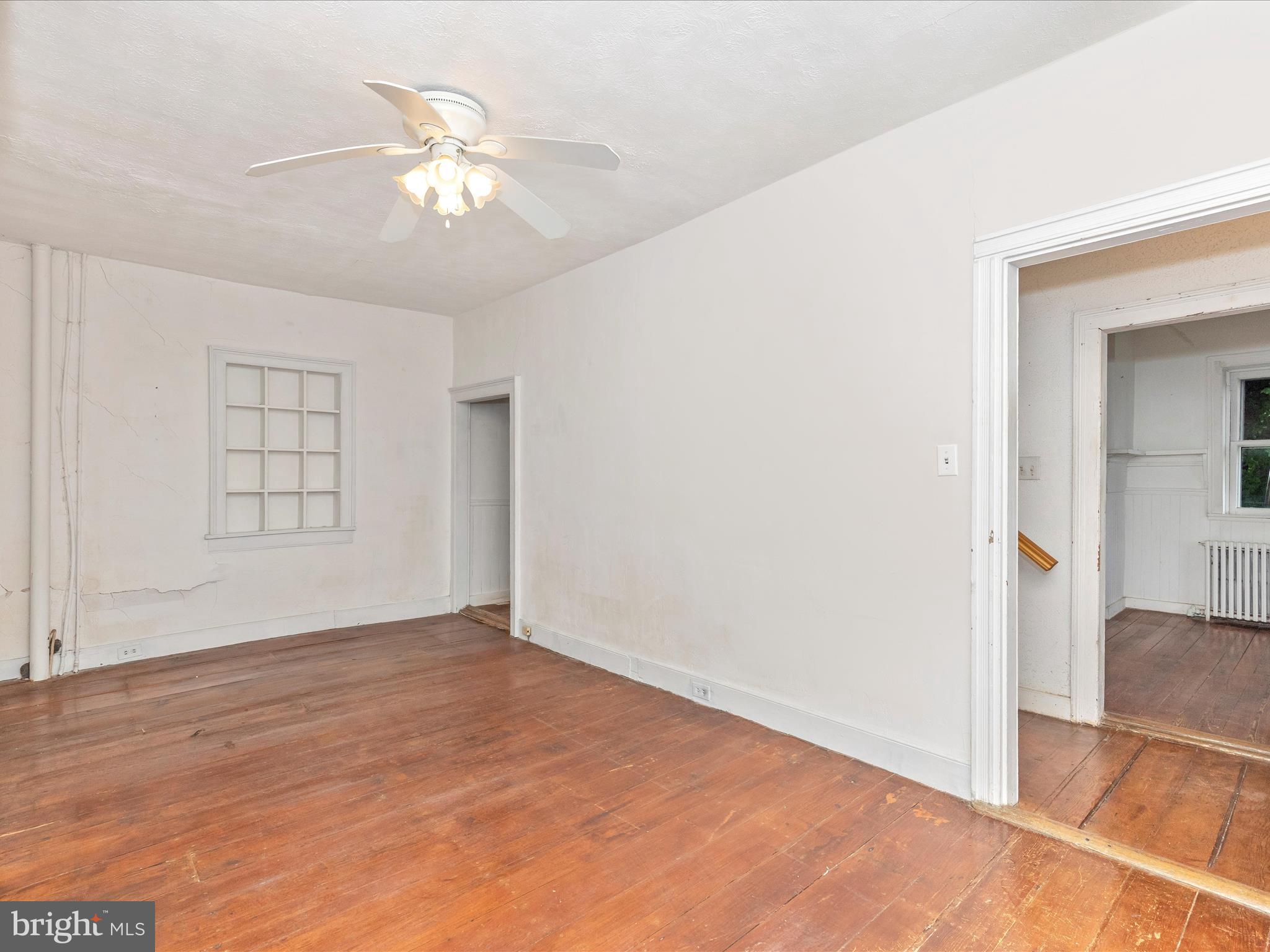 3204 Uniontown Road Westminster, MD 21158 - Photo 34 of 51 an empty room with fan and windows