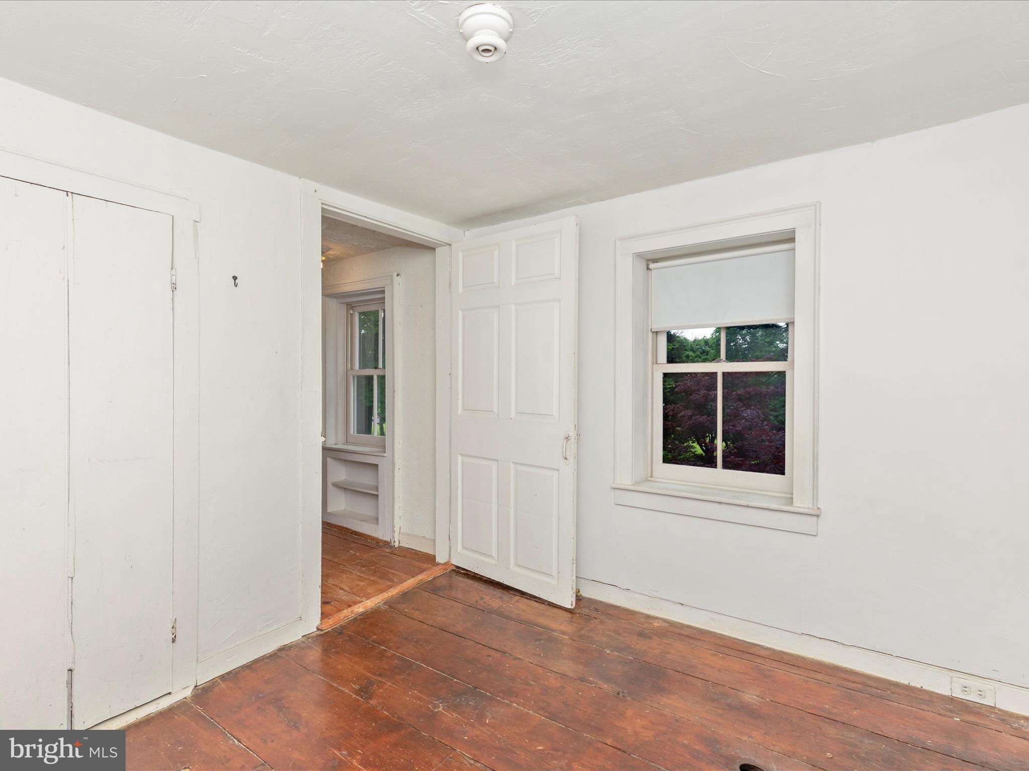3204 Uniontown Road Westminster, MD 21158 - Photo 39 of 51 an empty room with windows and closet