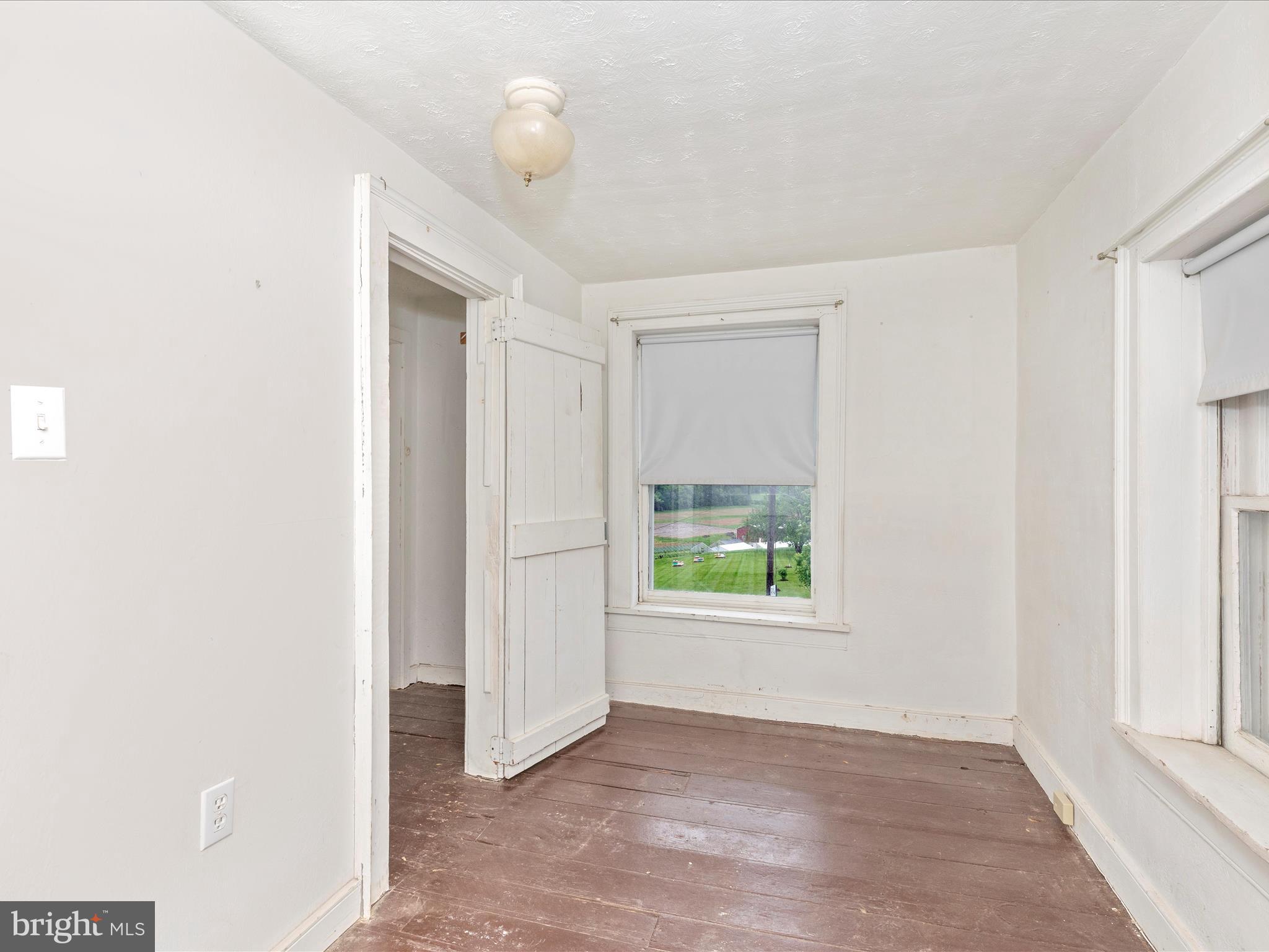 3204 Uniontown Road Westminster, MD 21158 - Photo 41 of 51 an empty room with windows