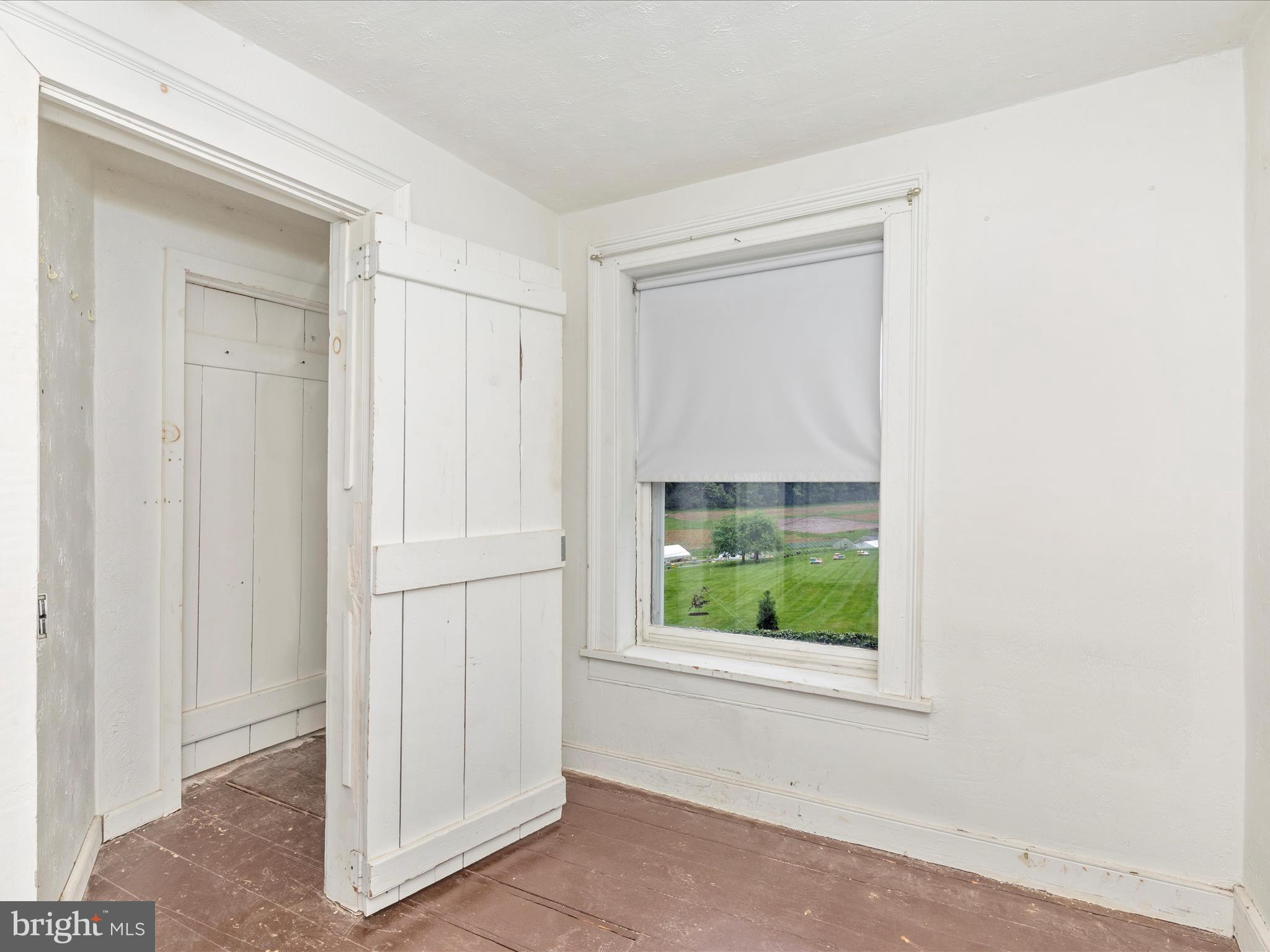 3204 Uniontown Road Westminster, MD 21158 - Photo 42 of 51 a view of an empty room with a window